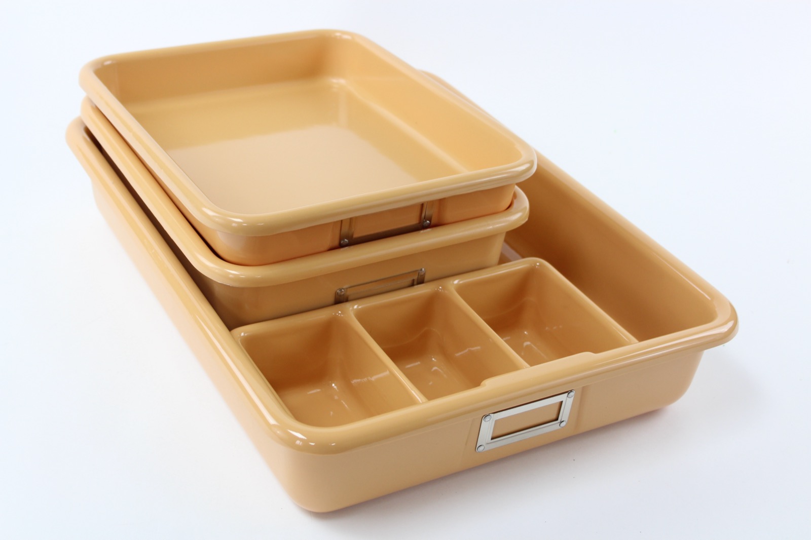 Shirley K's plastic storage trays for size comparison
