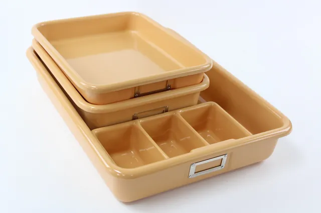 Shirley K's plastic storage trays for size comparison
