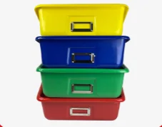 Stack of colored plastic organizational storage trays with custom thermoforming